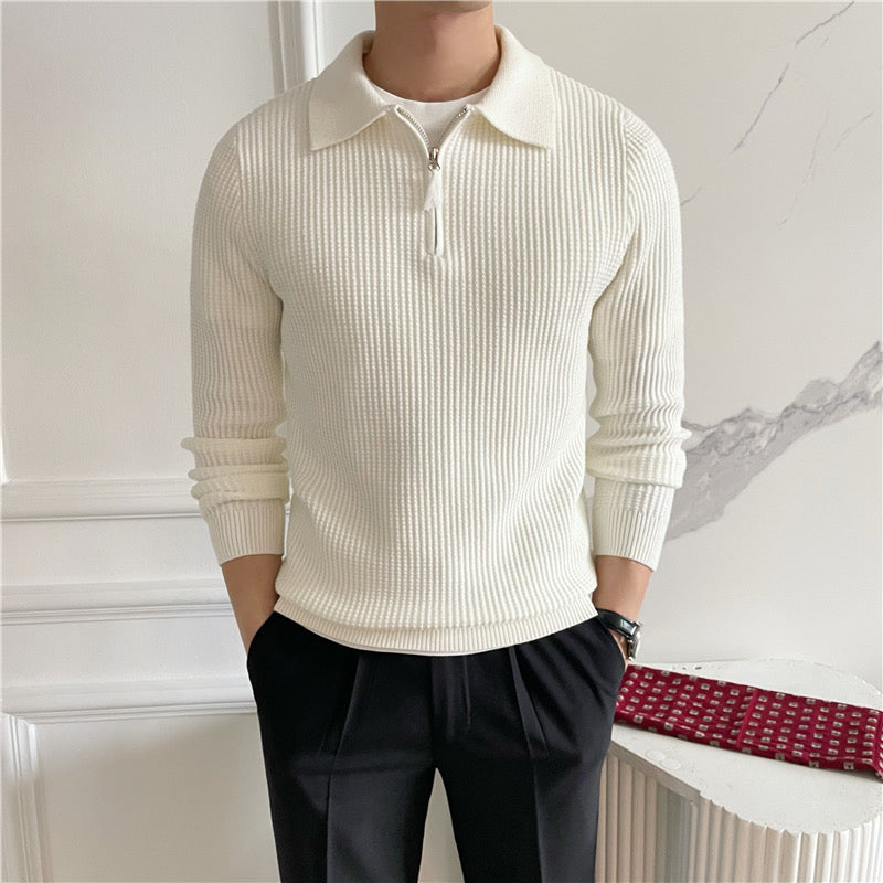 Detail of the soft cotton knit texture on the men's jumper