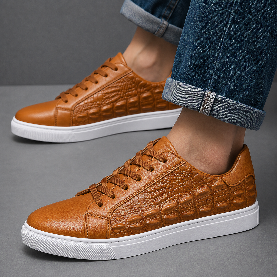 Pair of men's genuine leather court sneakers viewed from above