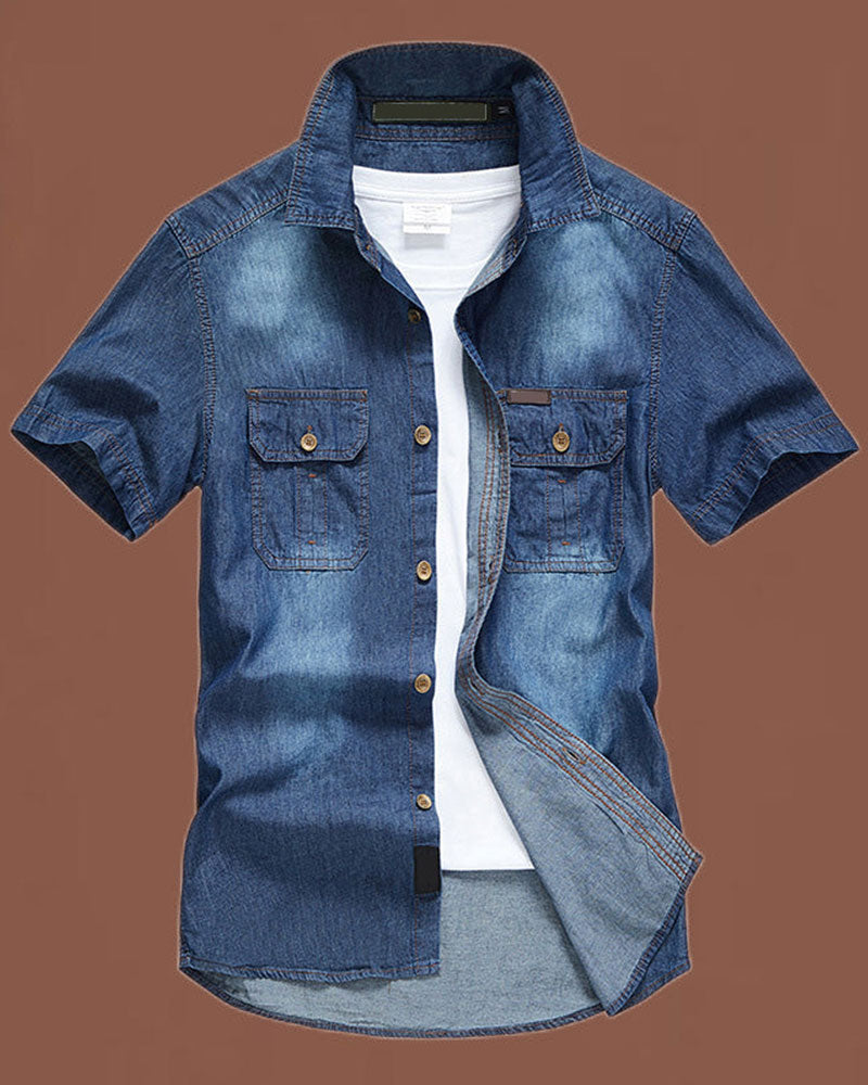 Close-up of the men's short sleeve denim shirt's denim fabric and collar
