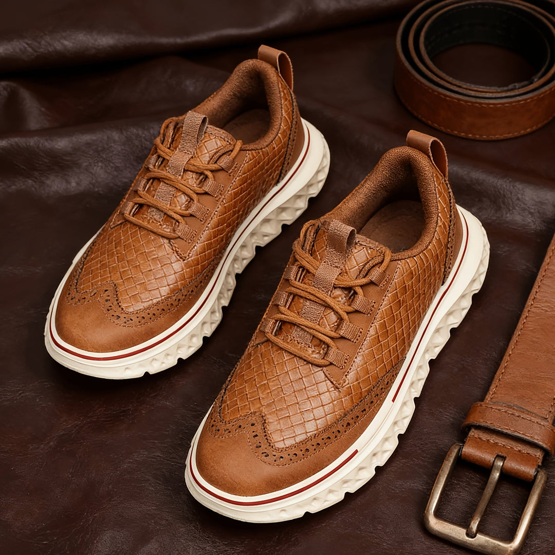 Men's textured brogue sneakers shown from the side