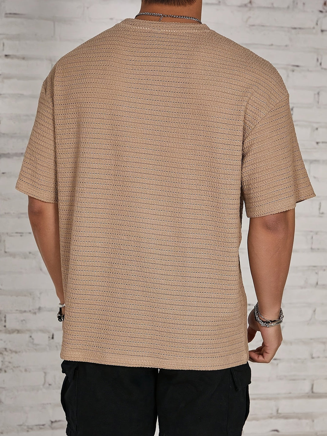 Side view of men's waffle shirt with long sleeves and textured finish