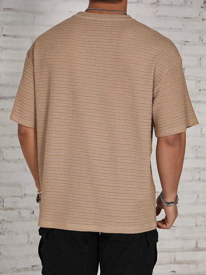 Side view of men's waffle shirt with long sleeves and textured finish