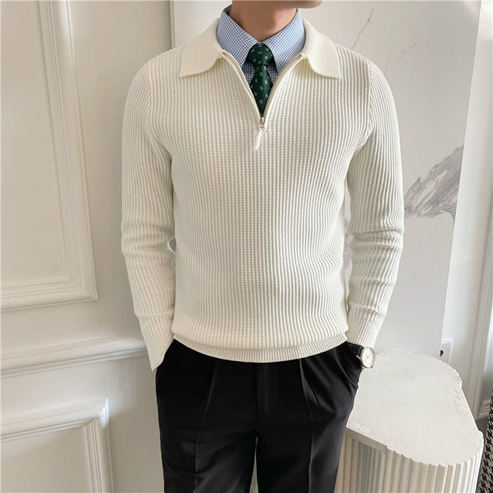 Close-up of the ribbed hem on the men's cotton knit jumper