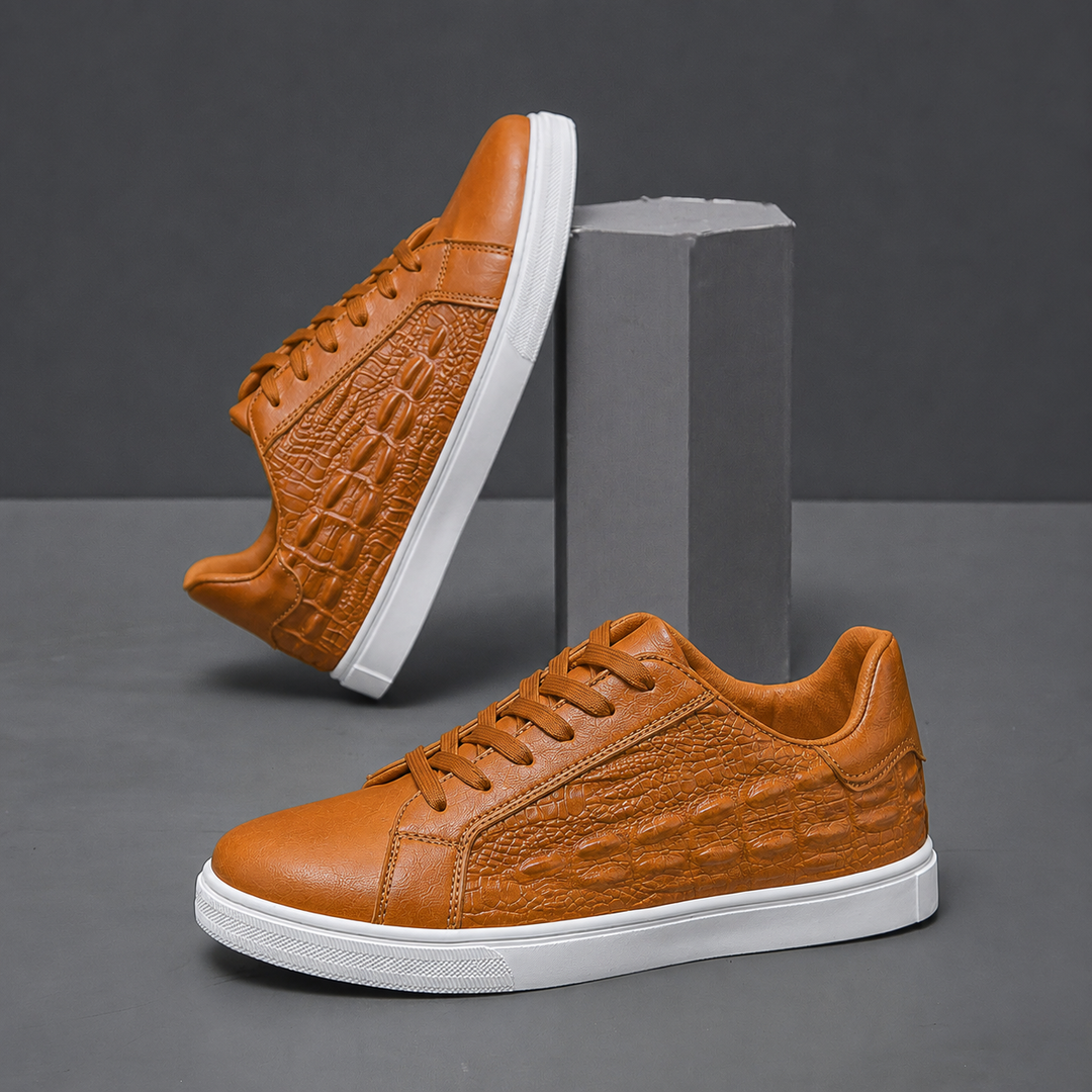 Close-up of the textured leather upper on a men's court sneaker