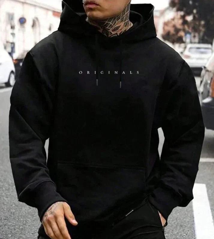 Men's drawstring hoodie shown in a relaxed streetwear fit