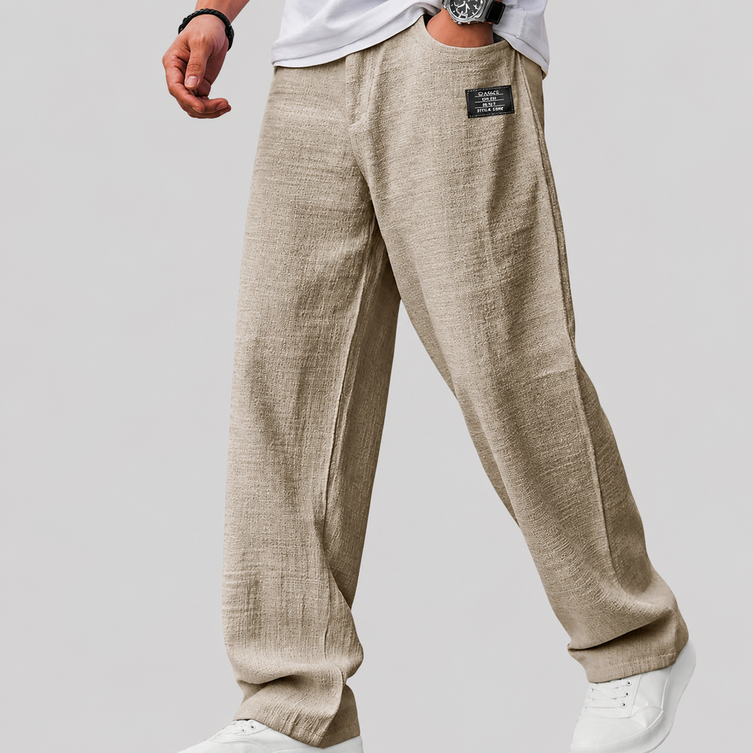 Men's linen wide-leg trousers shown from the back