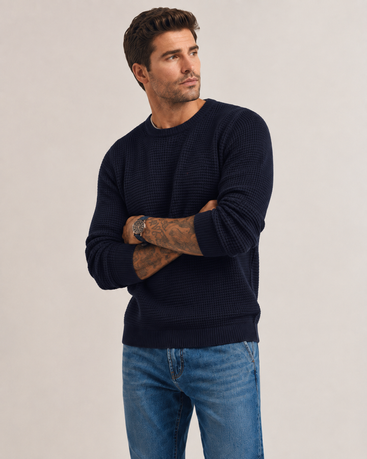 Men's structured knit pullover displayed as an everyday layering piece