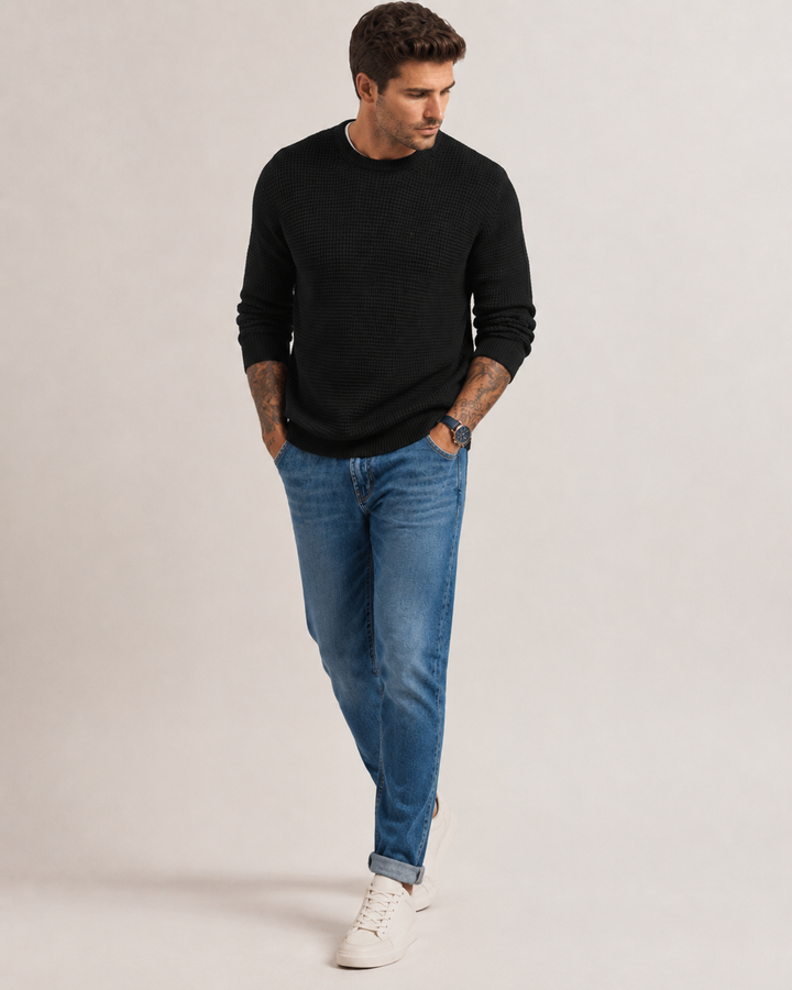 Men's structured knit pullover styled for a smart-casual look