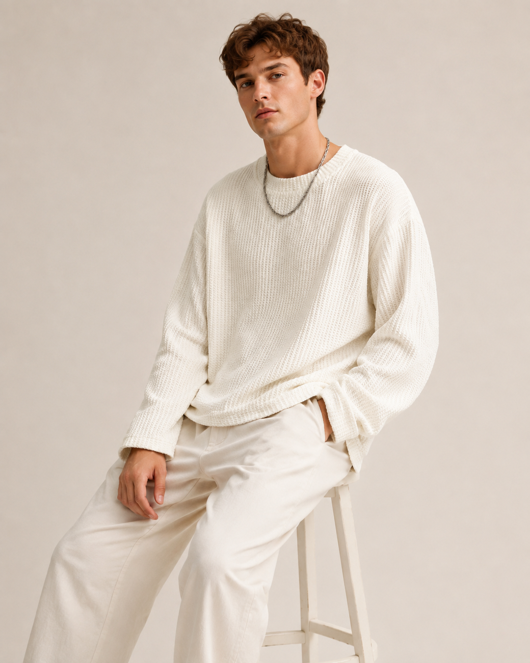 Detail of the neckline and waffle texture on the pullover