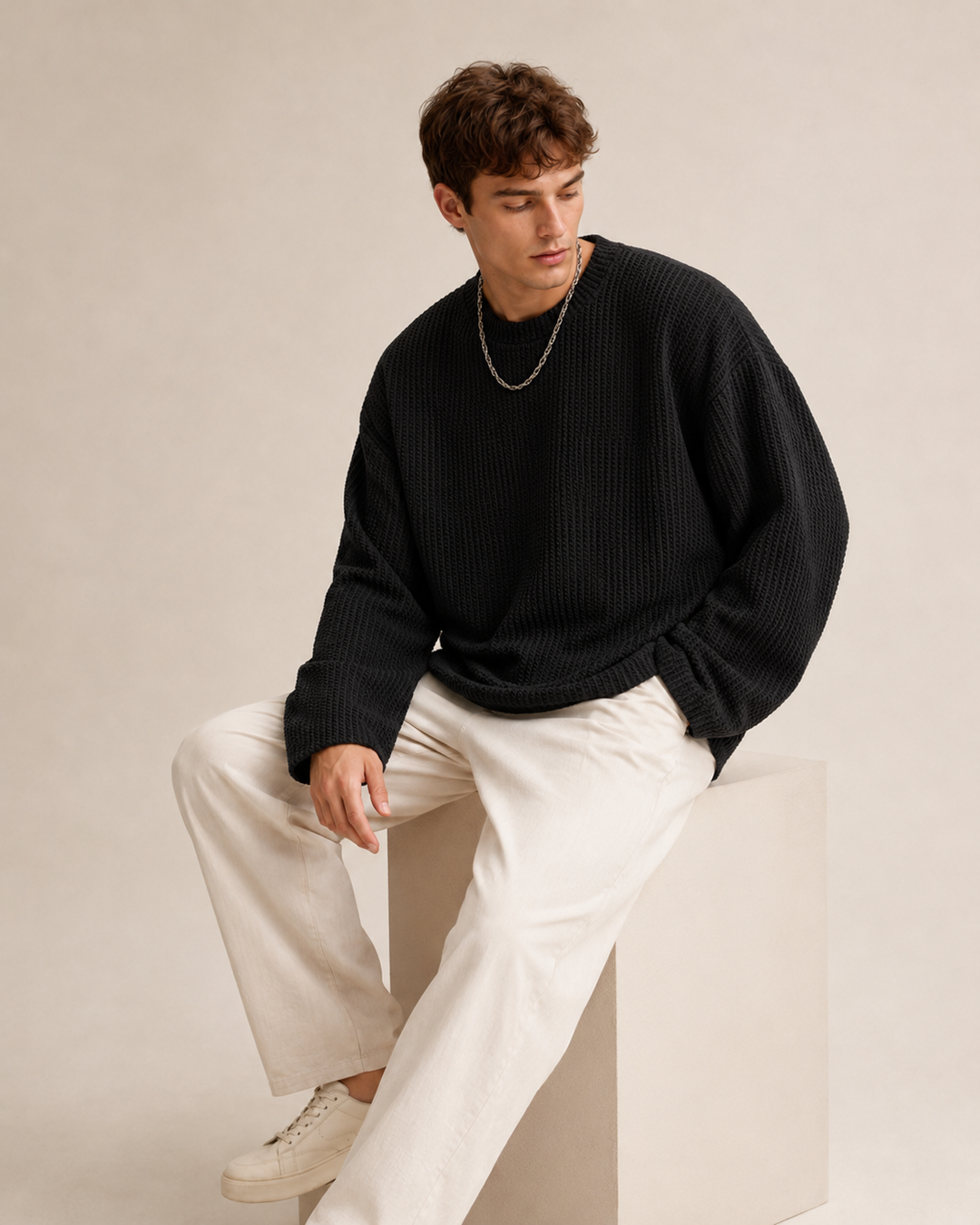 Close-up view of the textured knit on a men's pullover