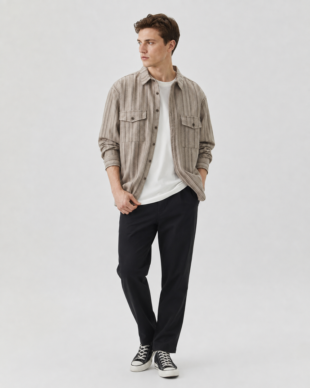 Front view of a men's cord overshirt with a button fastening