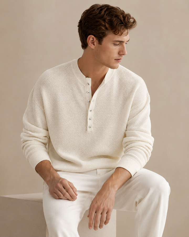 Men's Henley top showing the button placket and neckline