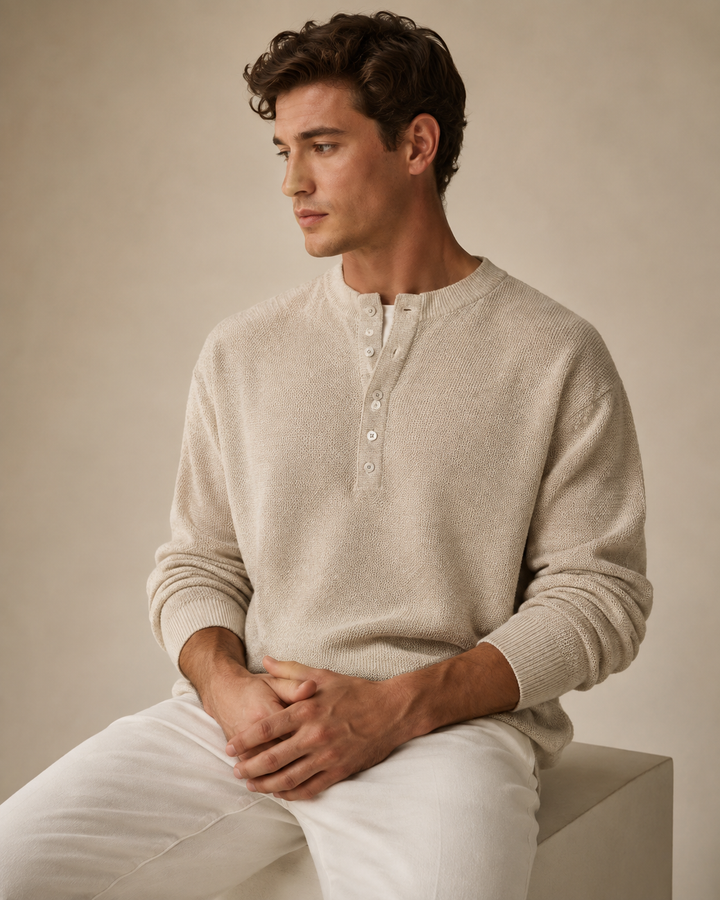 Detail of the button fastening on the men's textured Henley top