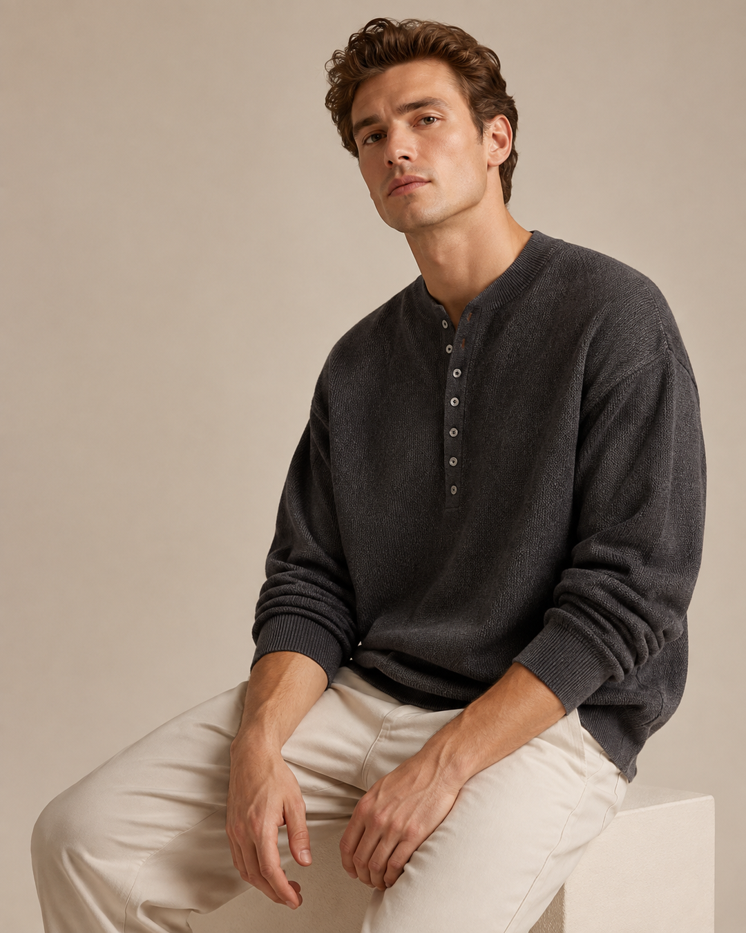 Side view of the men's textured knit Henley top