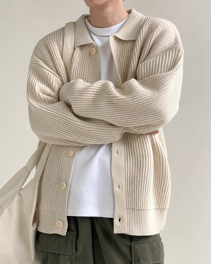 Men's cardigan showing the sleeve and cuff detailing