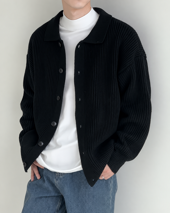 Detail of the ribbed knit texture on a men's cardigan