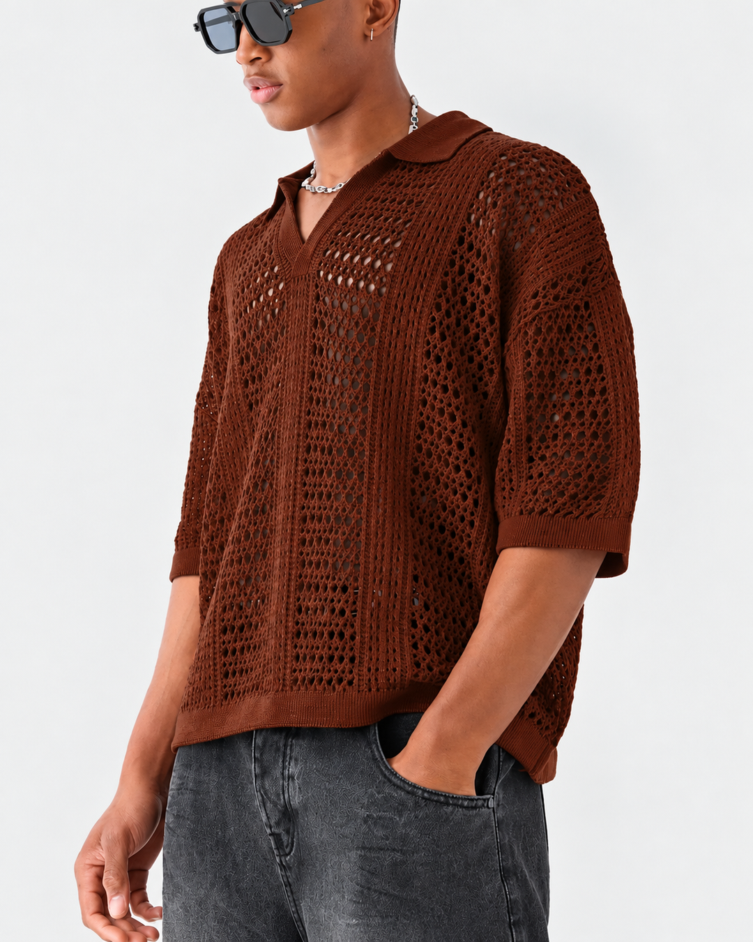 Men's open-knit polo shirt displayed against a plain background