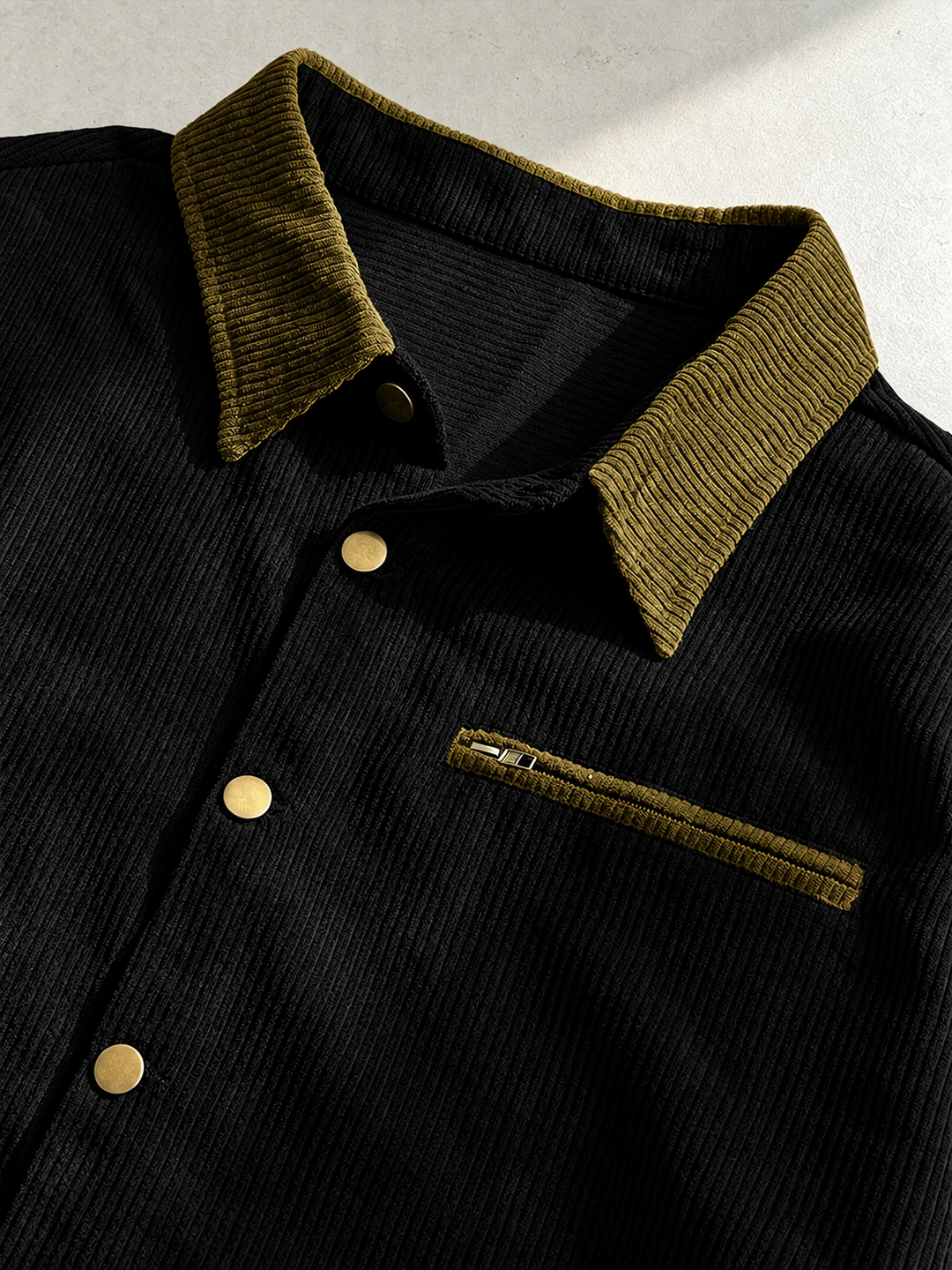 Men's corduroy shirt jacket styled as a versatile outer layer