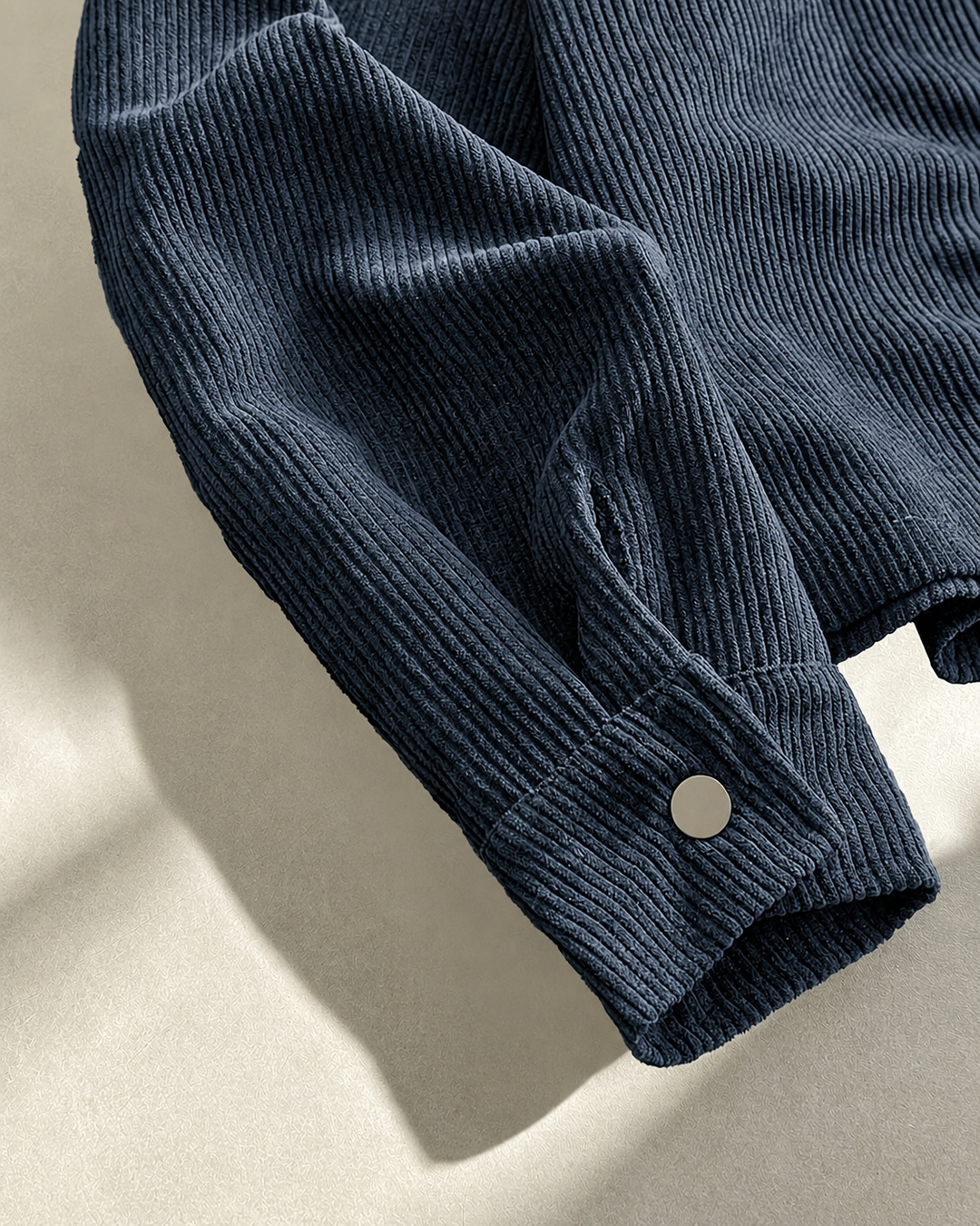 Full view of a men's corduroy shirt jacket with contrast collar