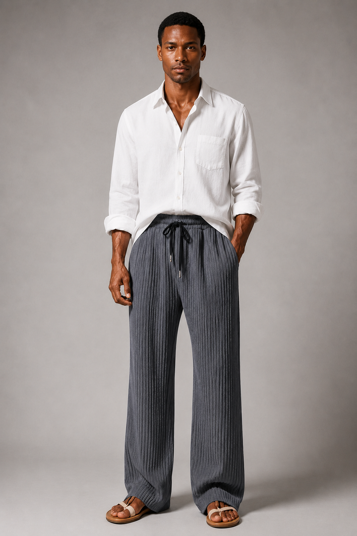 Full-length view of men's straight-leg ribbed trousers in relaxed fit