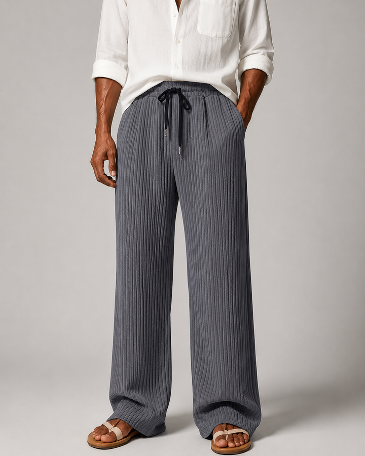 Men's straight-leg ribbed trousers in a relaxed fit shown from the front