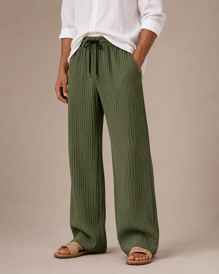 Detail of the pleated front on men's relaxed-fit ribbed trousers