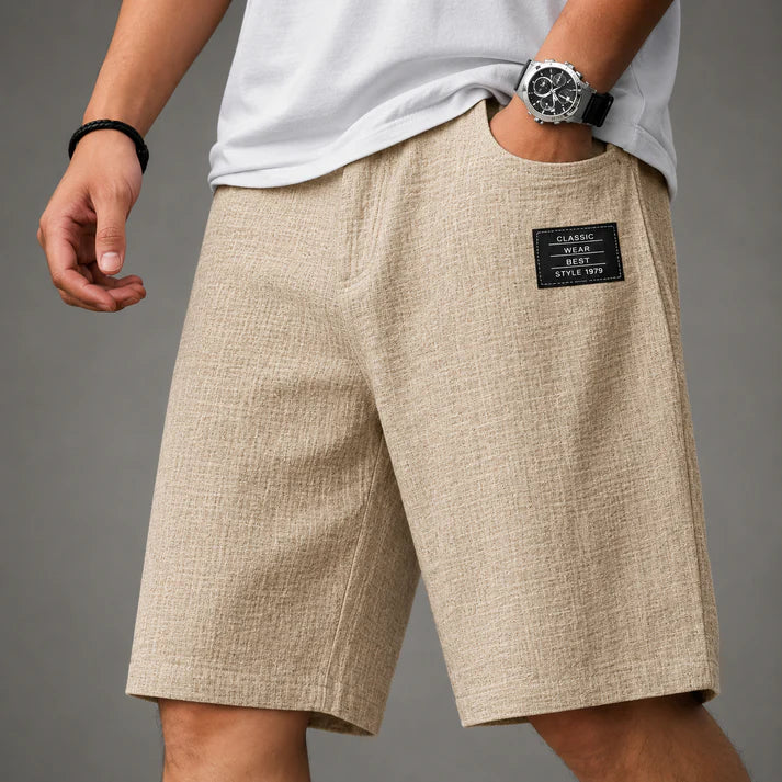Men's linen shorts in a relaxed fit shown from the back