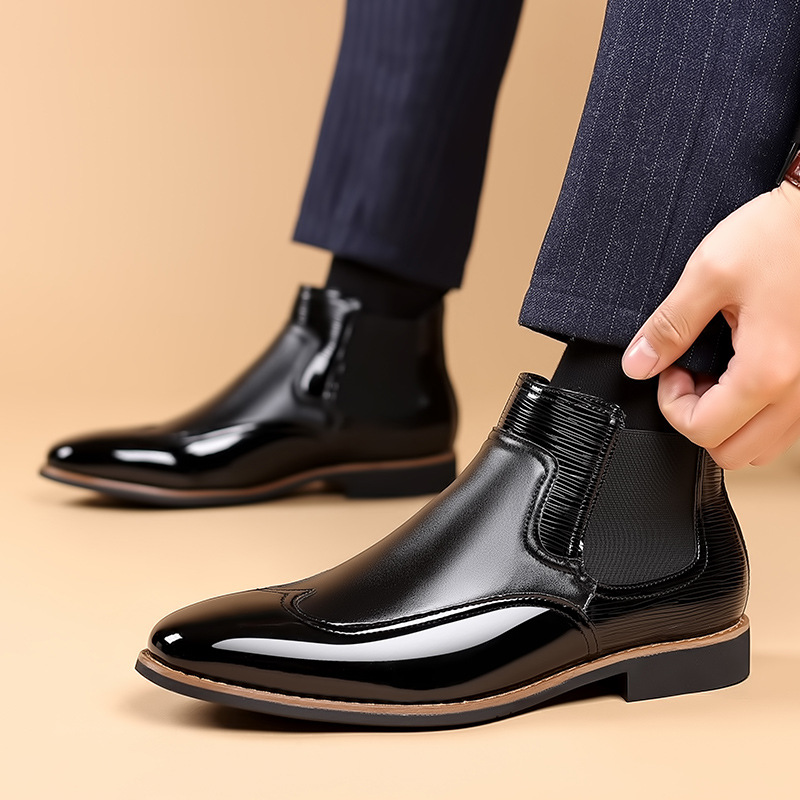 Top view of men's classic Chelsea boots with rounded toes