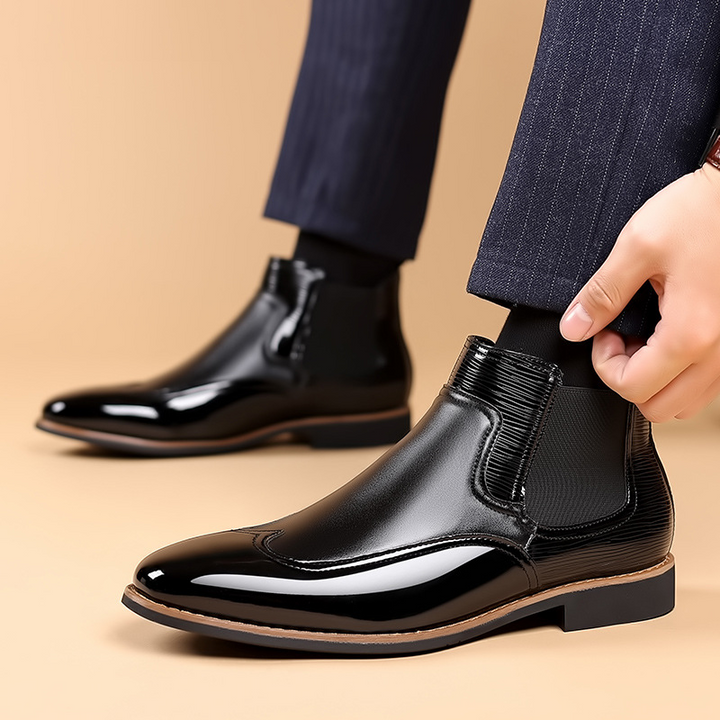 Top view of men's classic Chelsea boots with rounded toes