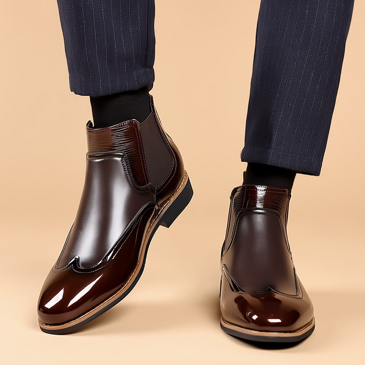 Close-up of the elastic side panel on a men's Chelsea boot
