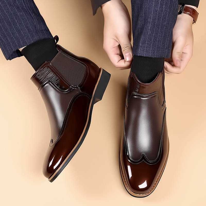 Rear view of classic men's Chelsea boots with pull tabs