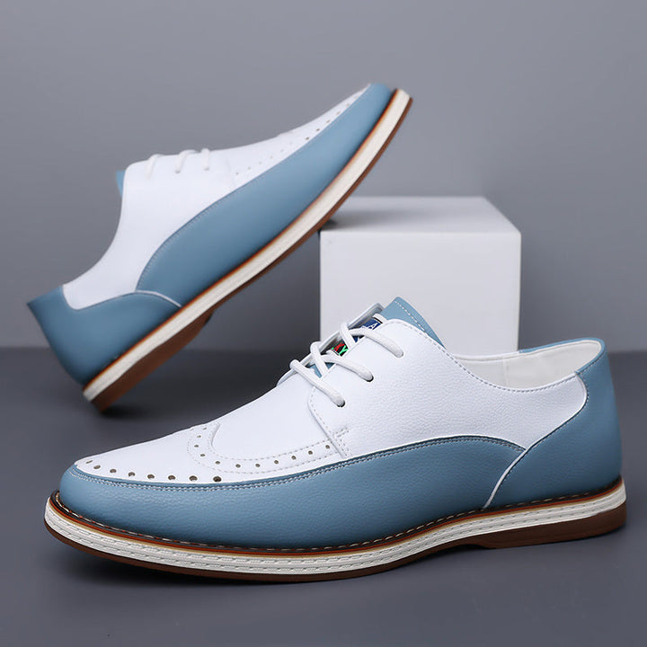 Men's smart two-tone brogue shoes styled as formal leather footwear
