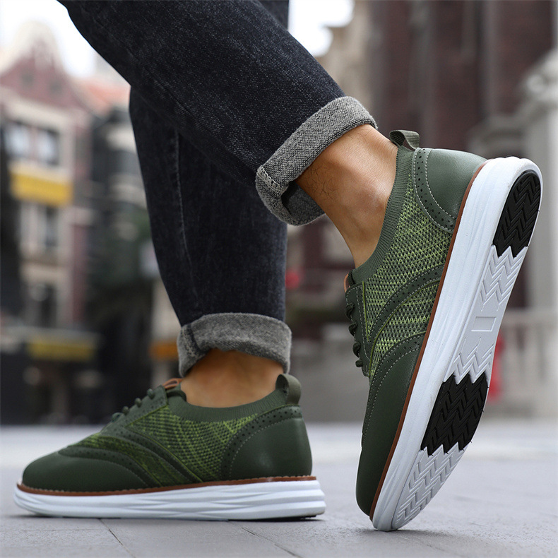 Close-up of men's leather trainers showing breathable mesh and stitching detail