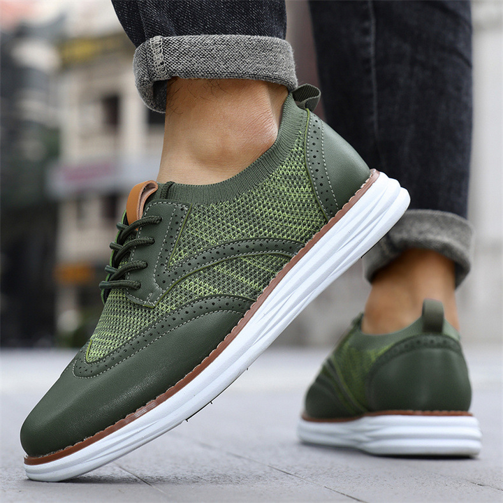 Side view of men's mesh leather trainers with cushioned sole and leather trim
