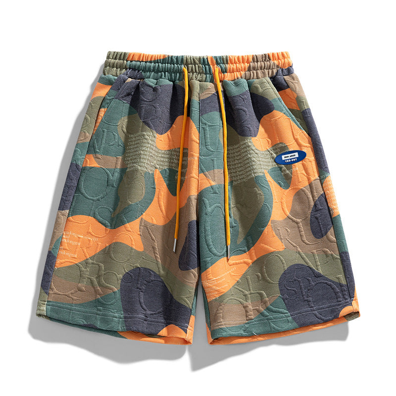 Men's camo relaxed fit shorts shown from the front on a white background