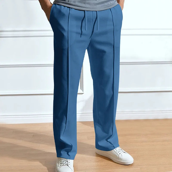 Men's slim fit flexible trousers shown from the front
