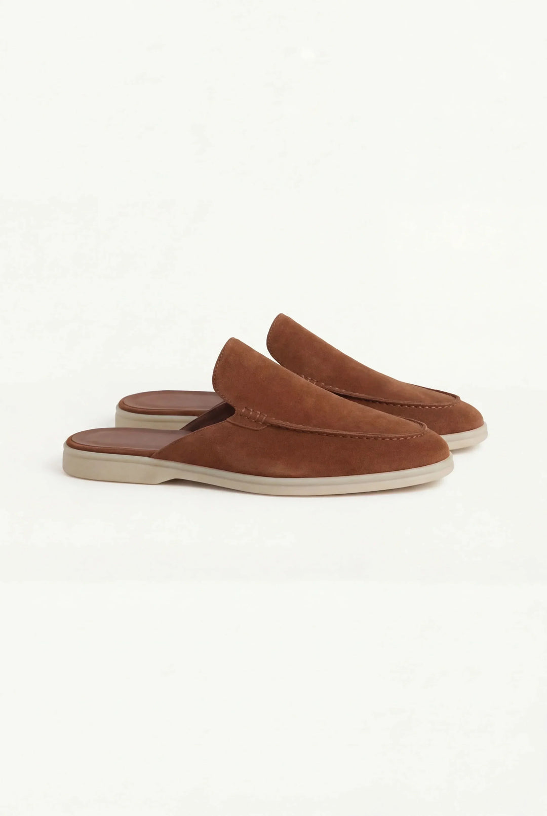 Top view of men's suede mules showing the soft upper and easy slip-on opening