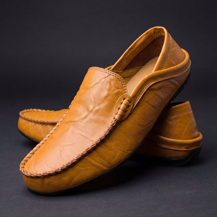 Men's slip-on loafers in a refined smart-casual style, front angled view