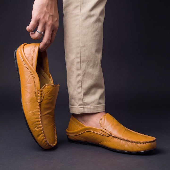 Men's loafers shown from above highlighting the slip-on opening