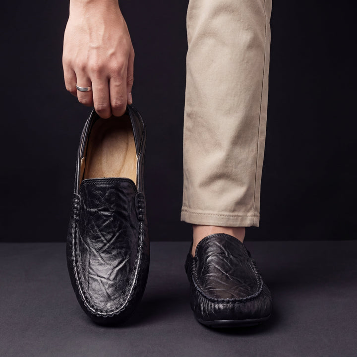 Men's smart-casual slip-on loafers viewed from the rear angle