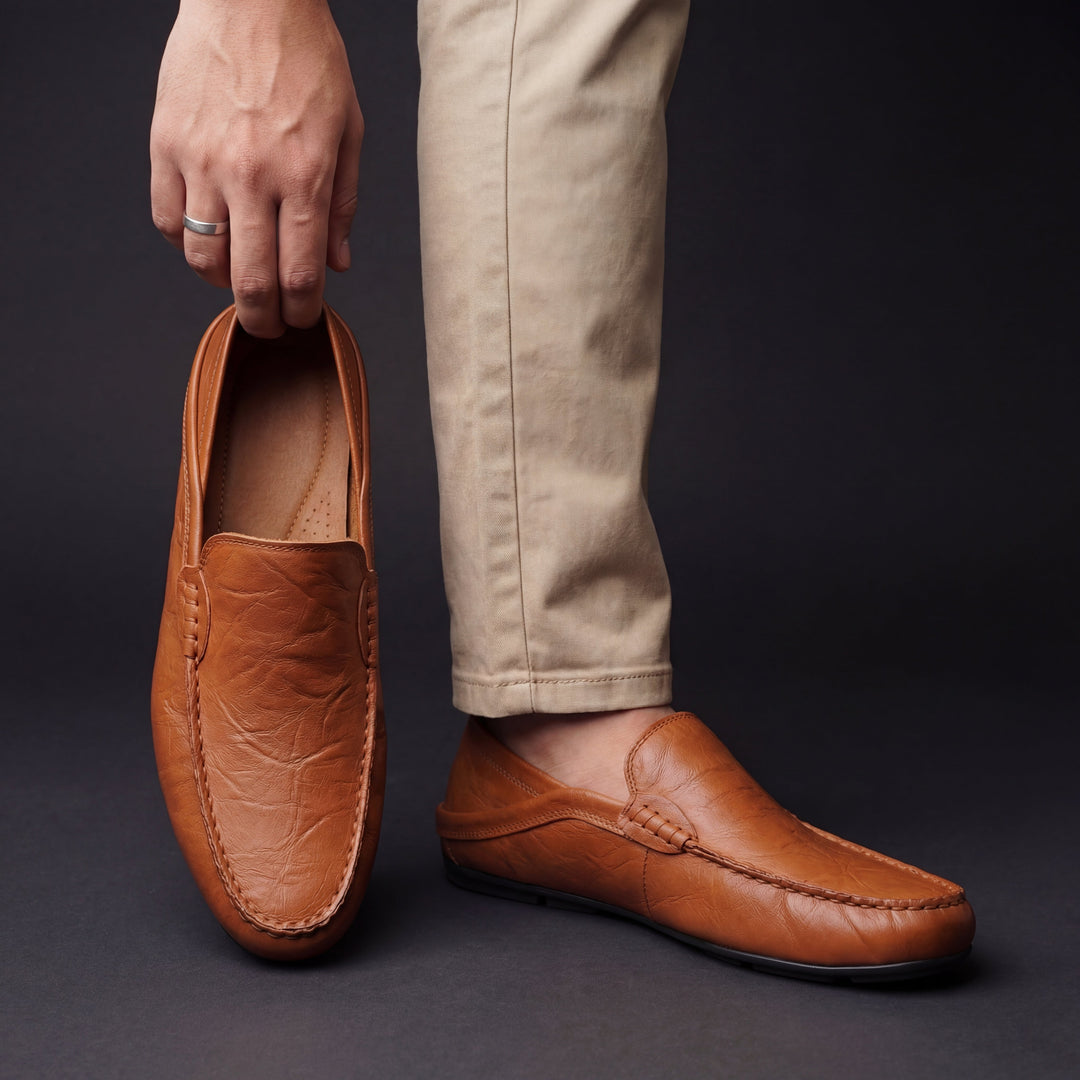 Sole view of men's slip-on loafers showing the outsole detail