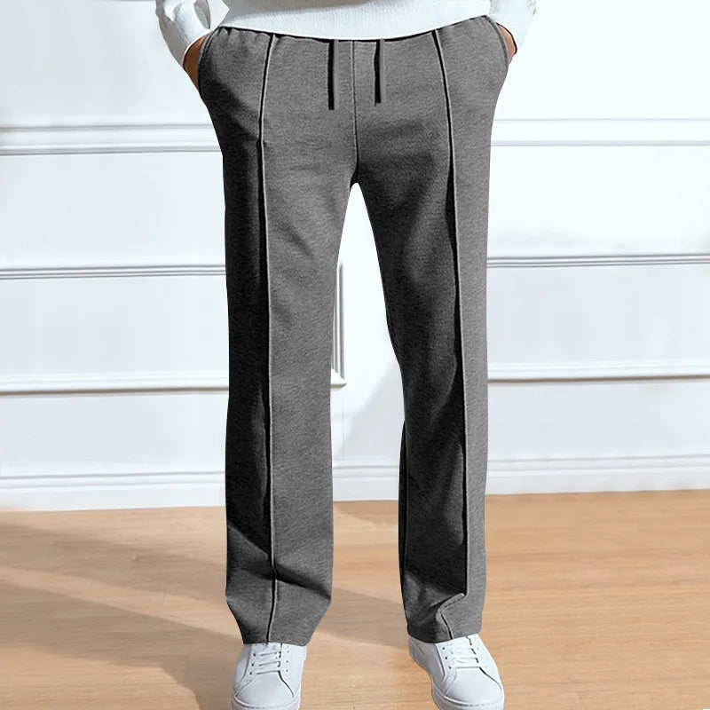 Men's flexible trousers showing the slim-fit leg shape