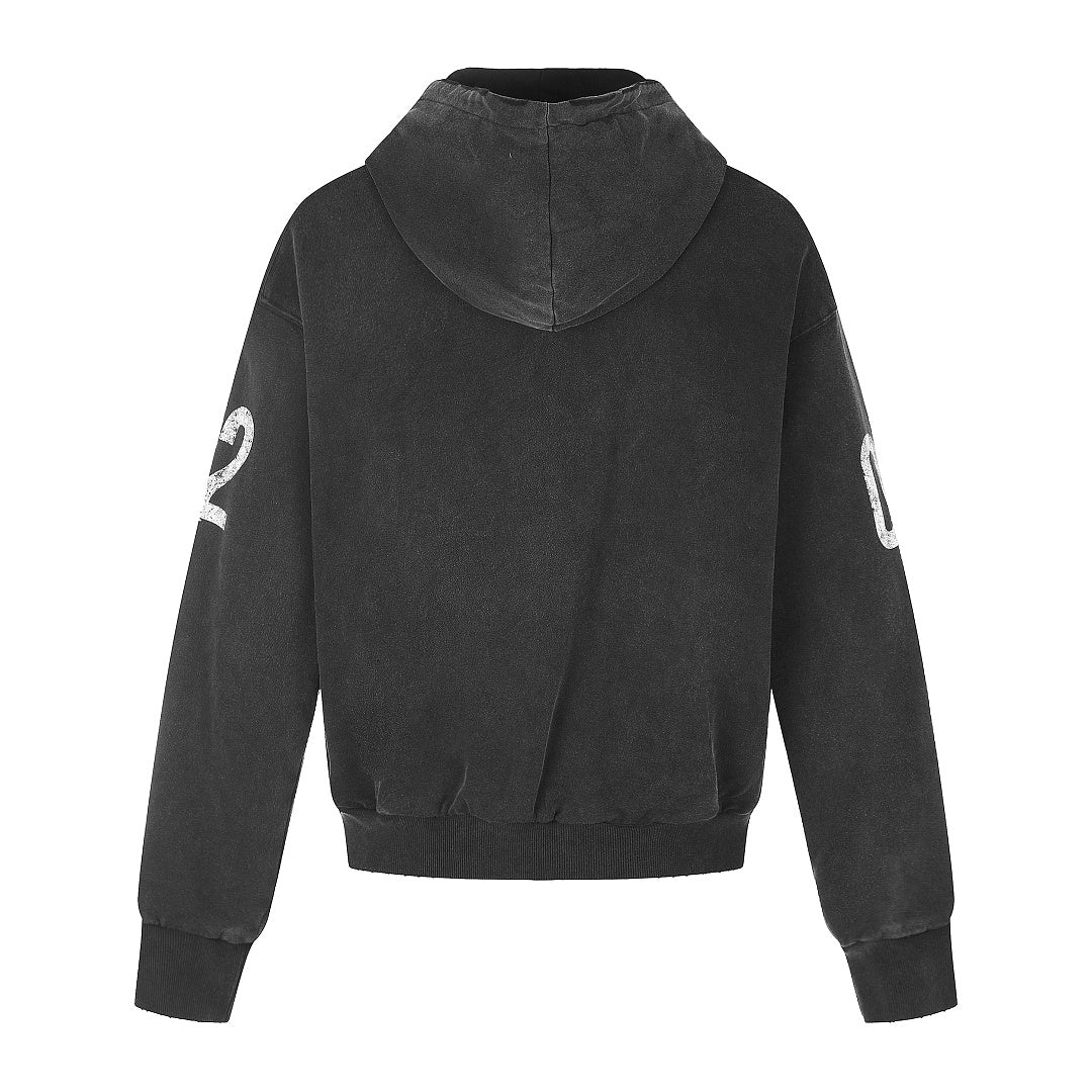 Close-up of the distressed 02 graphic on the hoodie