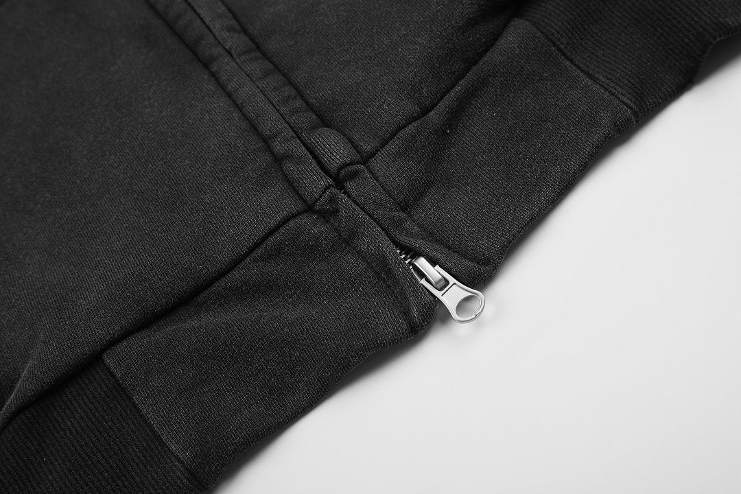 Side view showing the boxy fit of the graphic hoodie