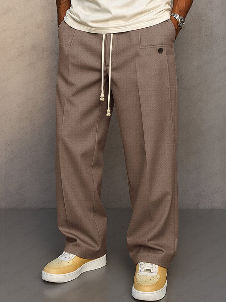 Close-up of the adjustable drawstring waistband on men's trousers
