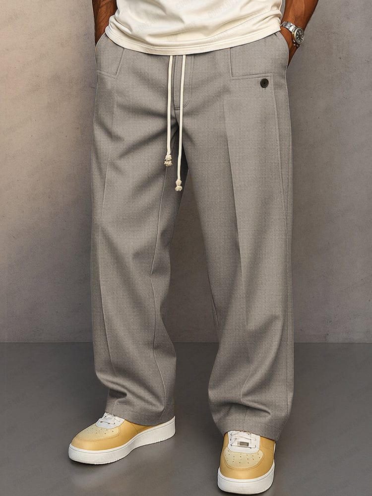 Side view of men's straight leg drawstring trousers showing the relaxed silhouette