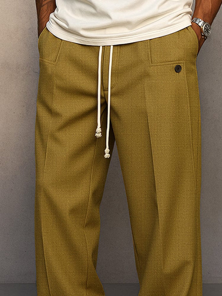 Detail of the straight-leg hem on men's drawstring trousers