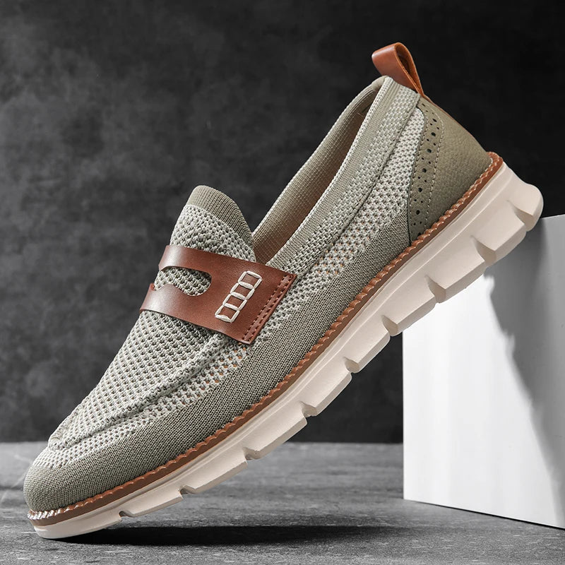 Top view of men's penny loafers highlighting the open mesh design