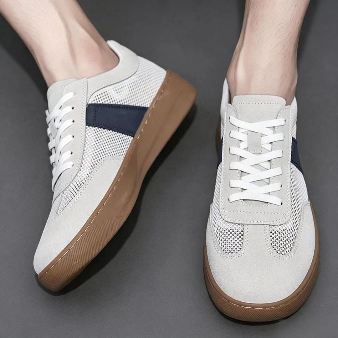 Top view of men's cobalt mesh suede sneakers with lace-up fastening
