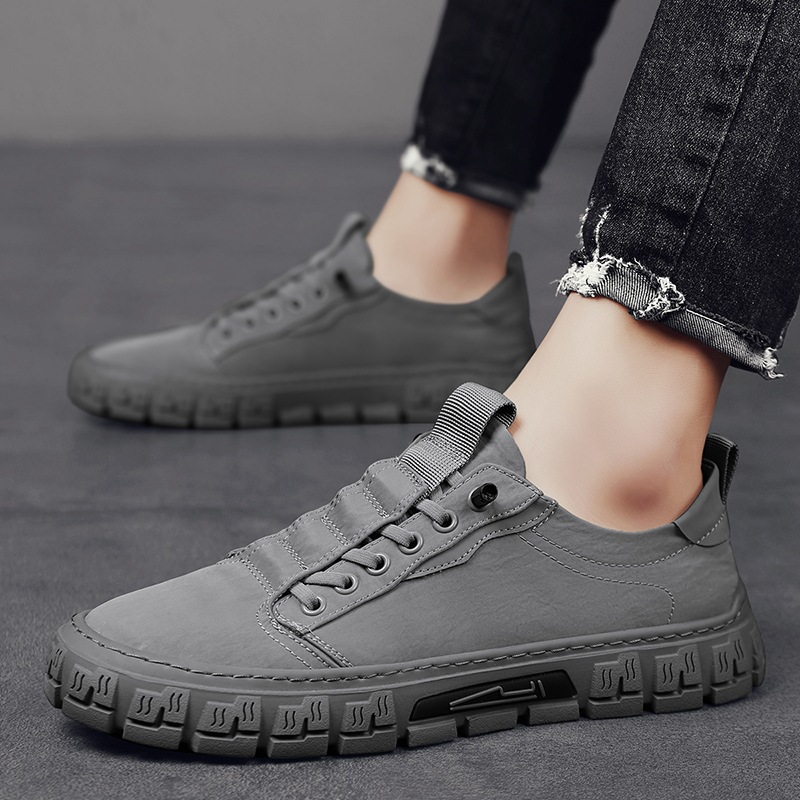 Top view of men's lace-up canvas trainers with tread sole